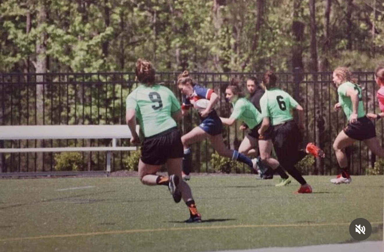 Sierra Morris on a breakaway run playing semi-professional rugby