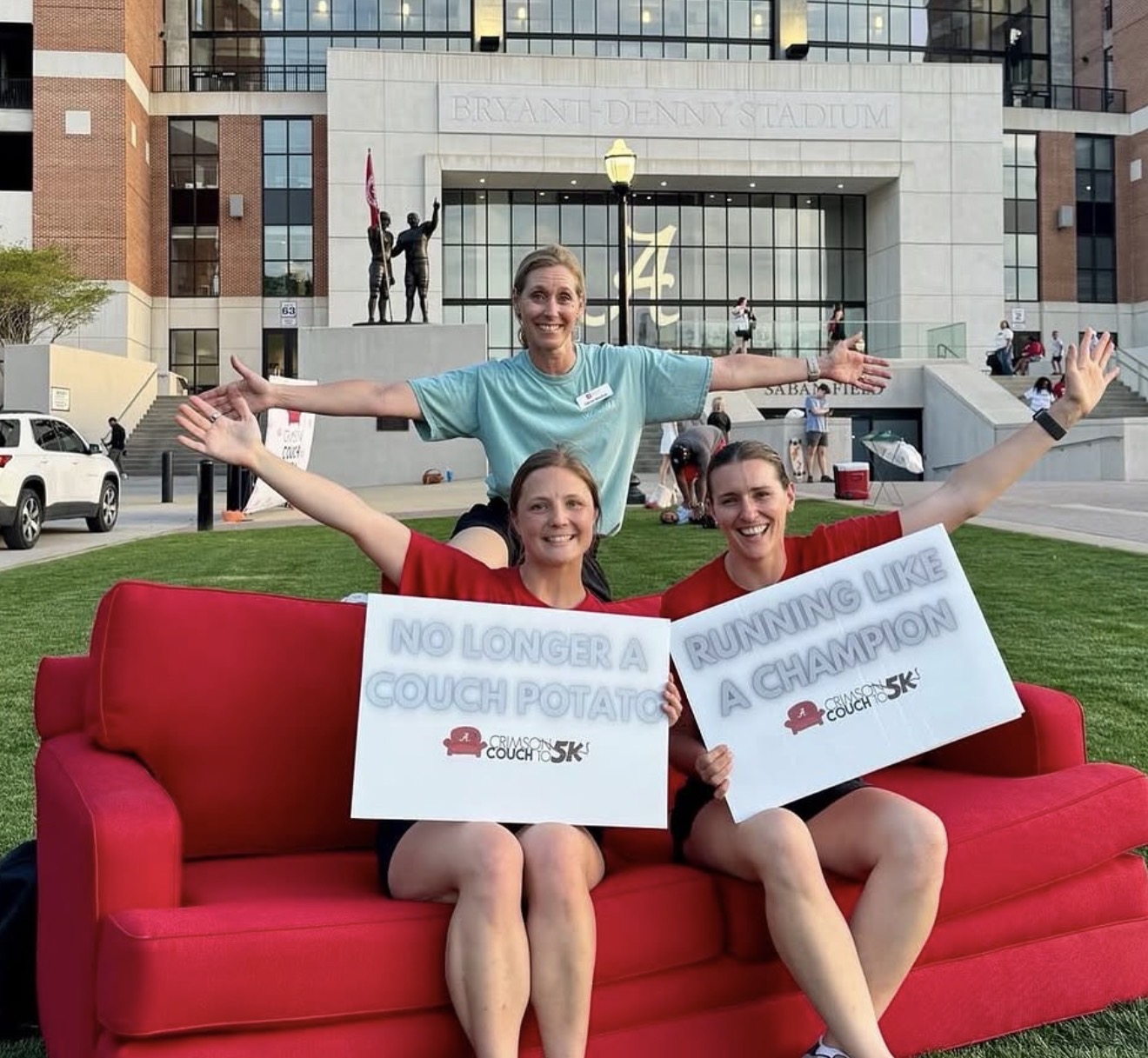 Sierra Morris at University of Alabama Crimson Couch to 5K event in front of Bryant-Denny Stadium